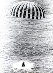 "Little Joe" 5B launched a Mercury spacecraft in a high-Q-abort test. The ring-sail parachute lands the spacecraft off the shore of Wallops Island, Virginia. The Little Joe rocket booster was developed as a cheaper, smaller, and more functional alternative to the Redstone rockets. Little Joe could be produced at one-fifth the cost of Redstone rockets and still have enough power to carry a capsule payload. Seven unmanned Little Joe rockets were launched at Wallops Island, Virginia, from August 1959 to April 1961. Image: NASA