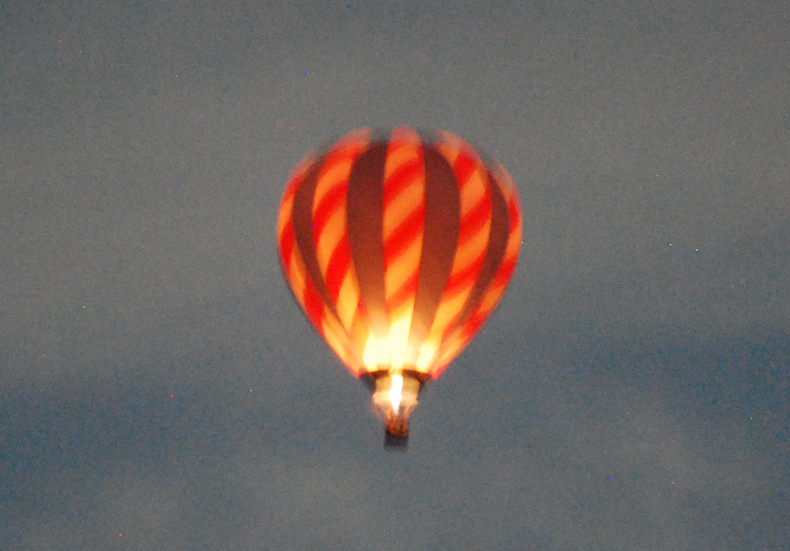 The hot air balloon, all lit up. And blurry. Photo: Jenny Bristol